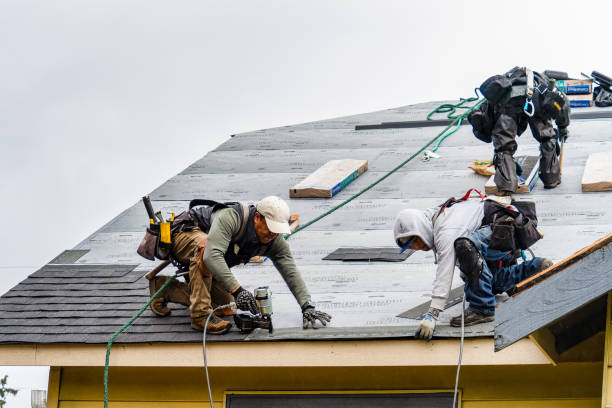 Professional Gutter Installation technician working in Sutersville, PA